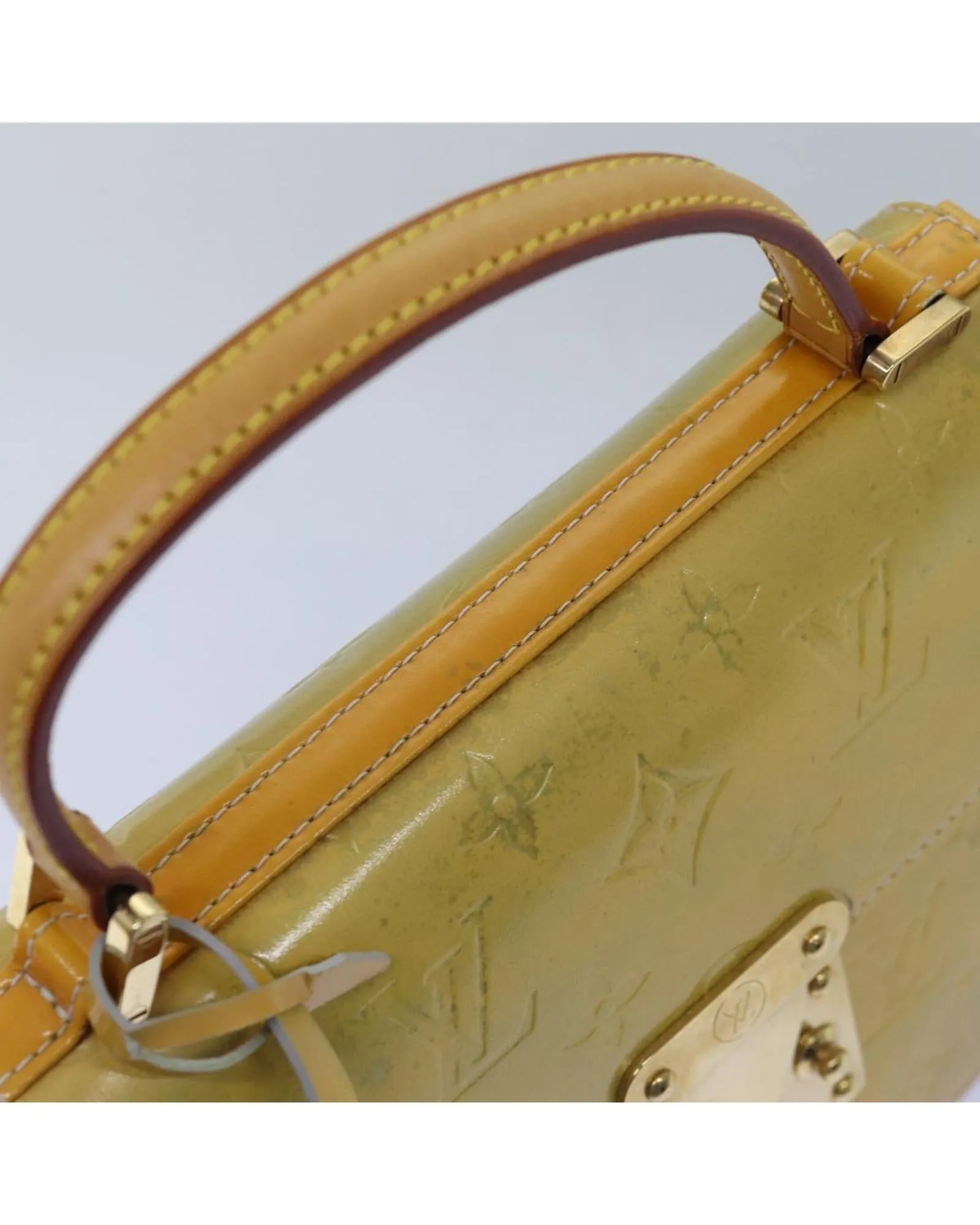 Patent Leather Handbag with Key Accessory and Clochette
